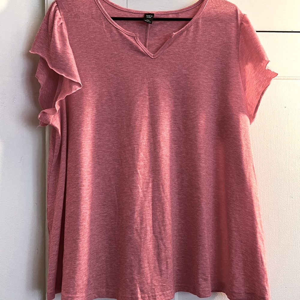 Women’s top, soft material, pink and size 3X.